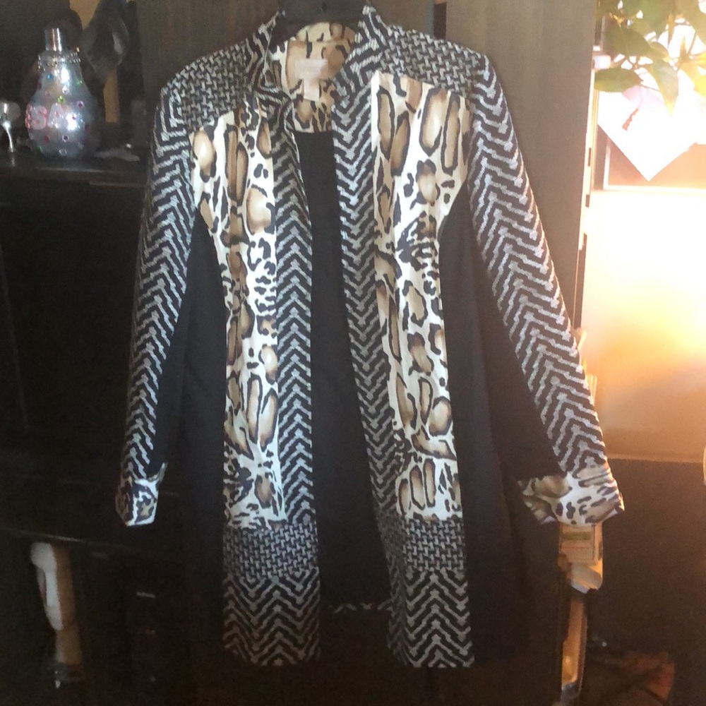 Animal print bomber jkt w/ faux trim. Knit duster w/ animal print. Knit jkt navy